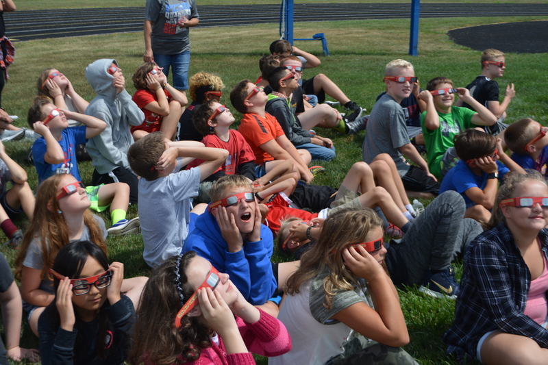 PCMS students react to seeing the eclipse through their special glasses.
